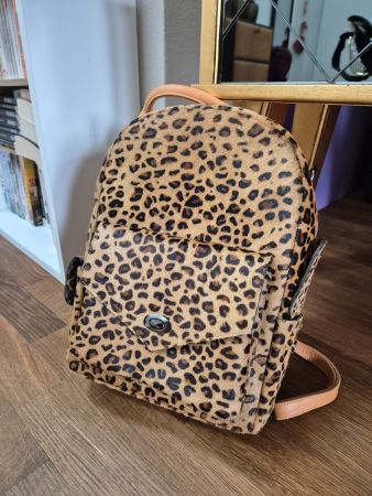 Handmade leopard print leather backpack