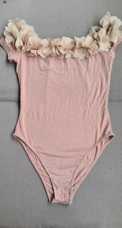 body rose stretch taille XS rose bonbon avec fleurs