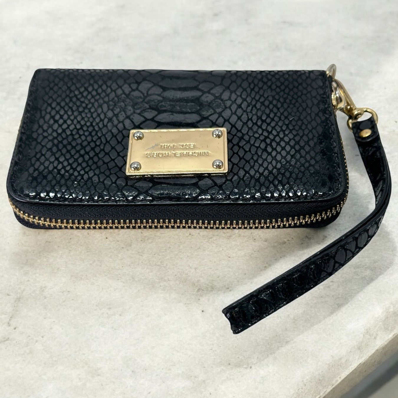 Michael Kors Portafogli: Portefeuille Michael Kors python noir – Usato da Morges venduto da vintix