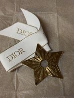 Charm Dior doré avec ruban