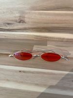 Ovale Retro Sonnenbrille / sunglasses mit roten Gläsern