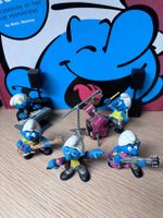 Schlumpf-Band mit Sänger, Keyboard, Gitarre und Schlagzeug
