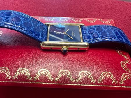 Cartier Tank Vermeil Argent plaqué or Saphir bleu