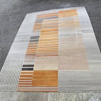 Grosser Teppich zu verschenken