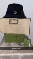 Chapeau Gucci noir authentique, état neuf, avec boîte.
