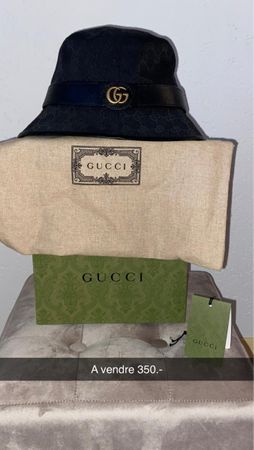 Chapeau Gucci noir authentique, état neuf, avec boîte.