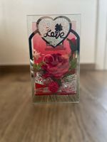 Romantischer Kerzenständer mit Rosen