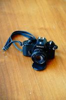 Nikon EM 50mm 1:1.8, frisch revidiert