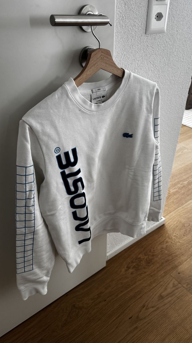 Lacoste Pullover & Sweatshirts: Lacoste Graphic Lines Pulli weiss Gr. S – Gebraucht aus Entlebuch von Dapodo 1