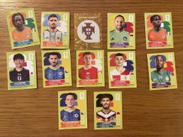 1 Wappen & 11 Spieler - Panini WM 2026