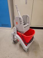 Taski Fahreimer mit Mopppresse