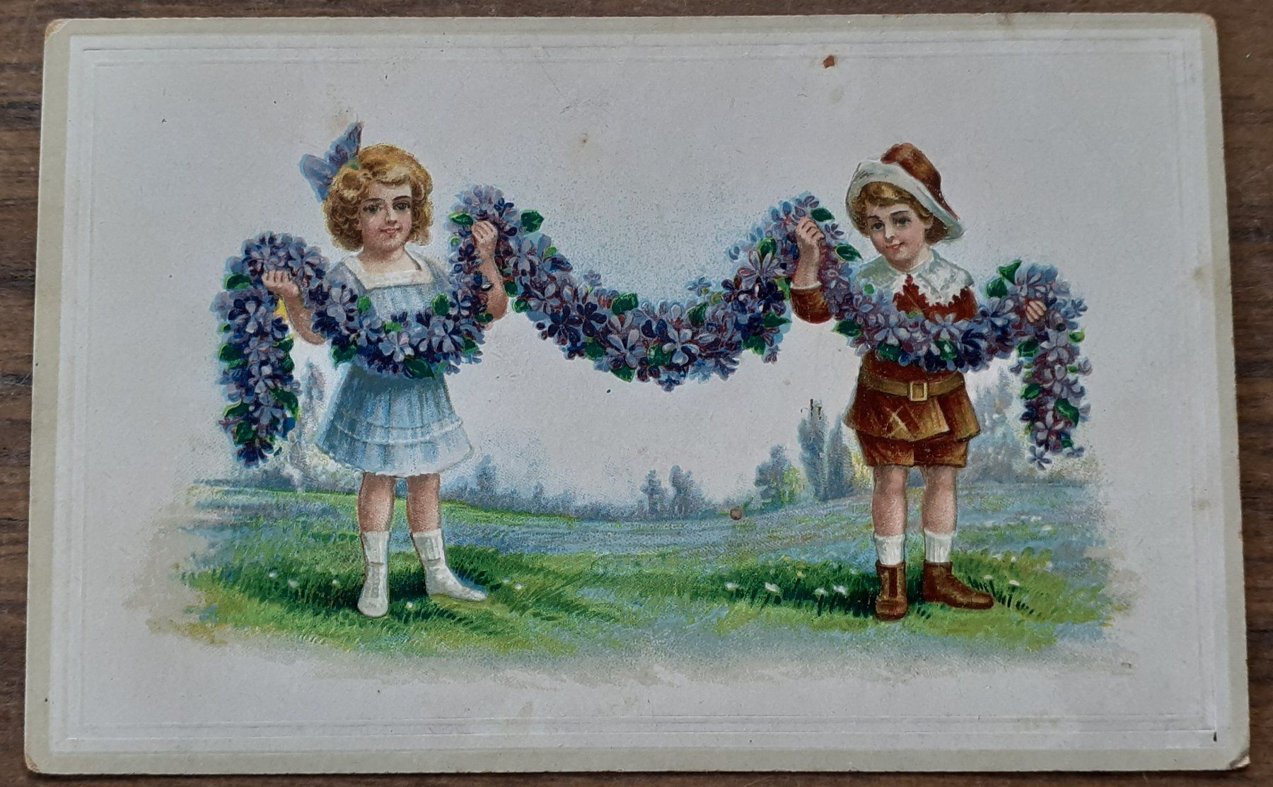 Cartoline postali: Ansichtskarte Kinder Veilchen Kranz antik – Usato da Mörschwil venduto da wunderkiste44