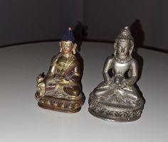 2 Buddha Figuren