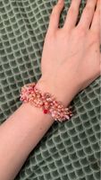 Beaded bracelet pink and red tones used condition
