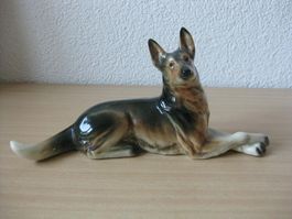 Ausverkauf: Schäferhund liegend, Porzellan