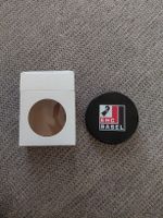 EHC Basel Puck mit Verpackung von Burger King 