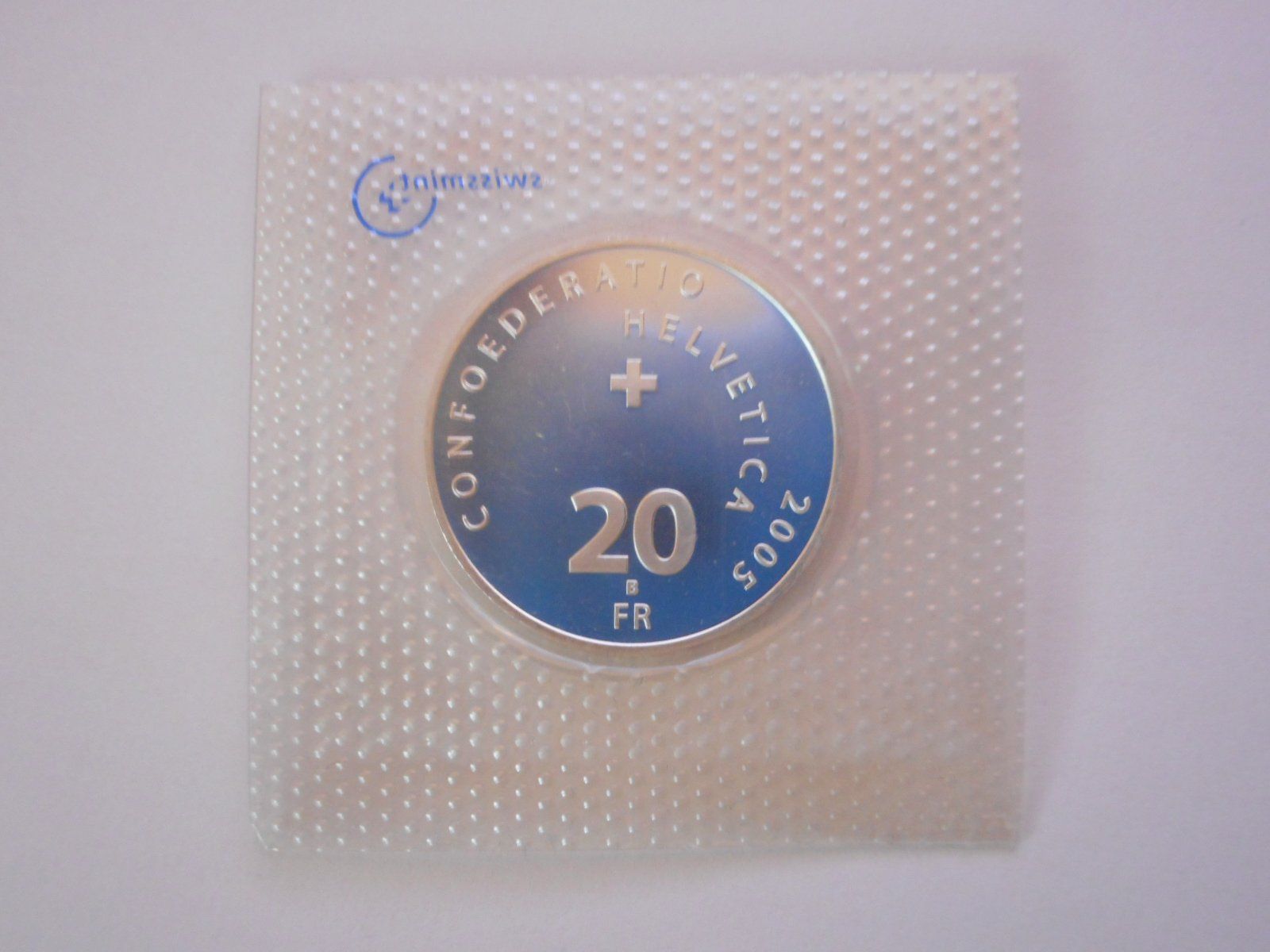 Tutti le monete: 20 Fr. 2005 silber  Autosalon Genf  unz/stgl – Nuovo e nell'imballaggio originale da Kriegstetten venduto da pizlad2010