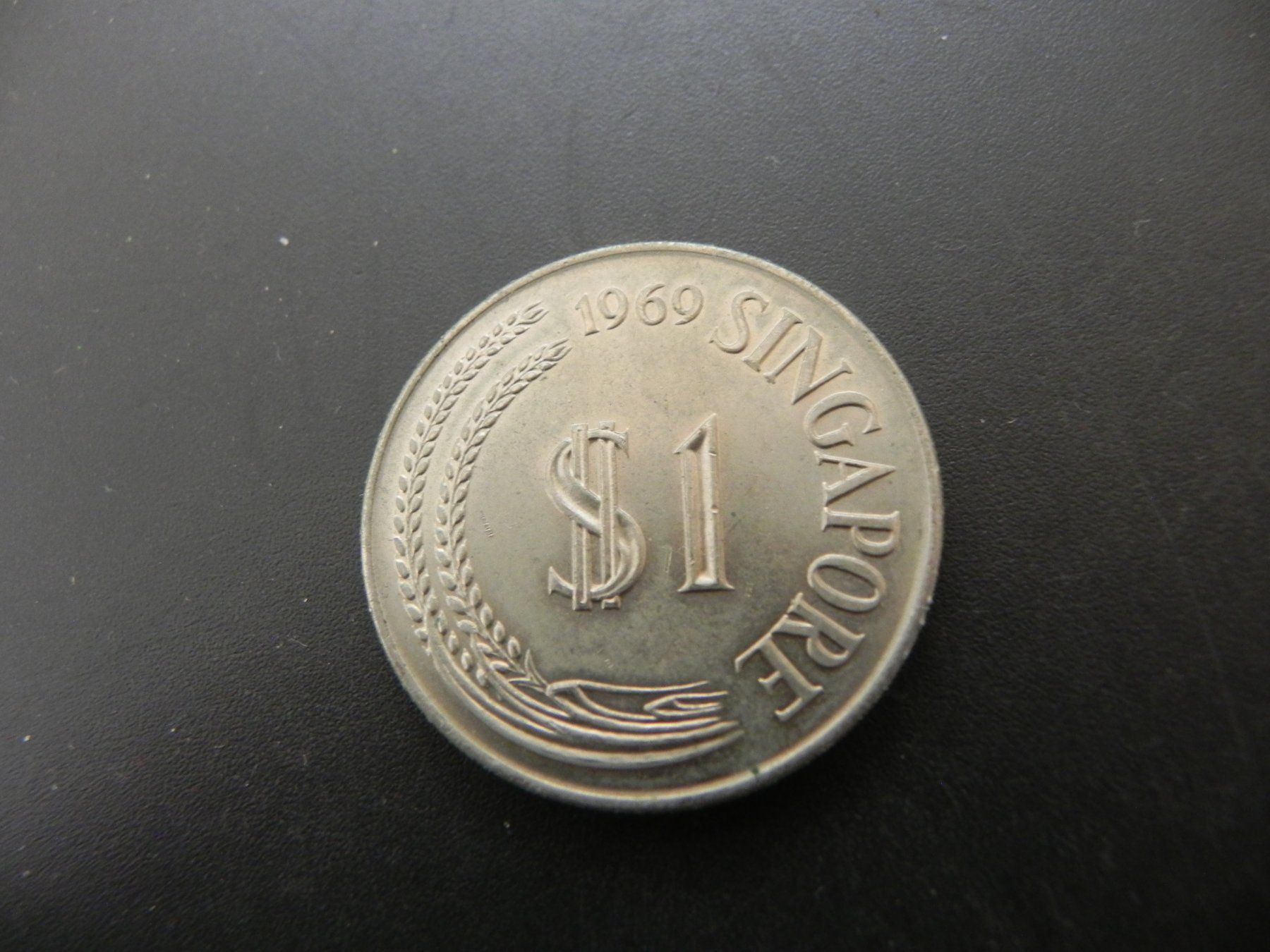 Tutti le monete: Singapur 1 Dollar 1969 – Usato da Biel/Bienne venduto da Gogolozi 1