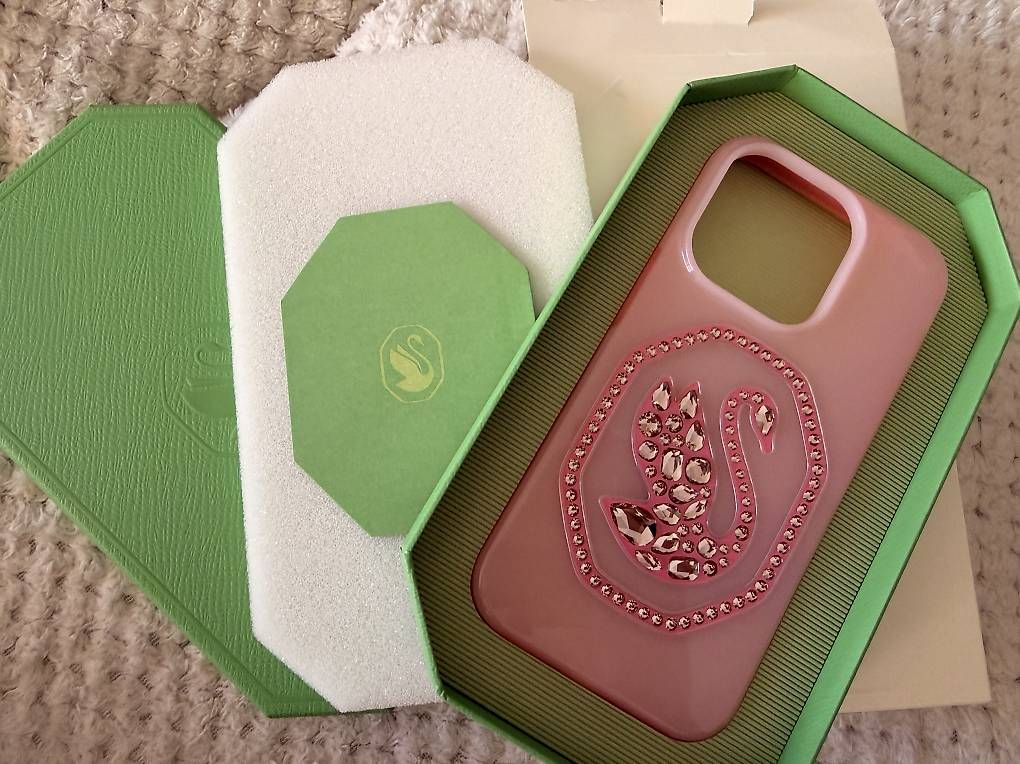 Swarovski Cover & Protezioni schermo: NEU OVP SWAROVSKI Case iPhone 14 Pro – Nuovo e nell'imballaggio originale da Embrach venduto da vmadia 1