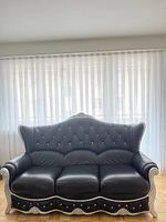 Echtleder Sofa's + Tisch + Spiegel