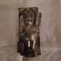 alte Schokoladengiessform Puppe mit dickem Bauch