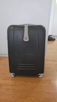 Valigia trolley rigida nera, ideale per le vacanze!