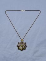 Broche-pendentif fleur or 585 sertie de diamants