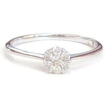 750 Weissgold Ring, 5mm, mit 7 Diamanten zus. 0.14ct., 990.-