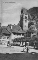 Dorfbrunnen, belebt, Kirche in Unterseen, Berner Oberland,