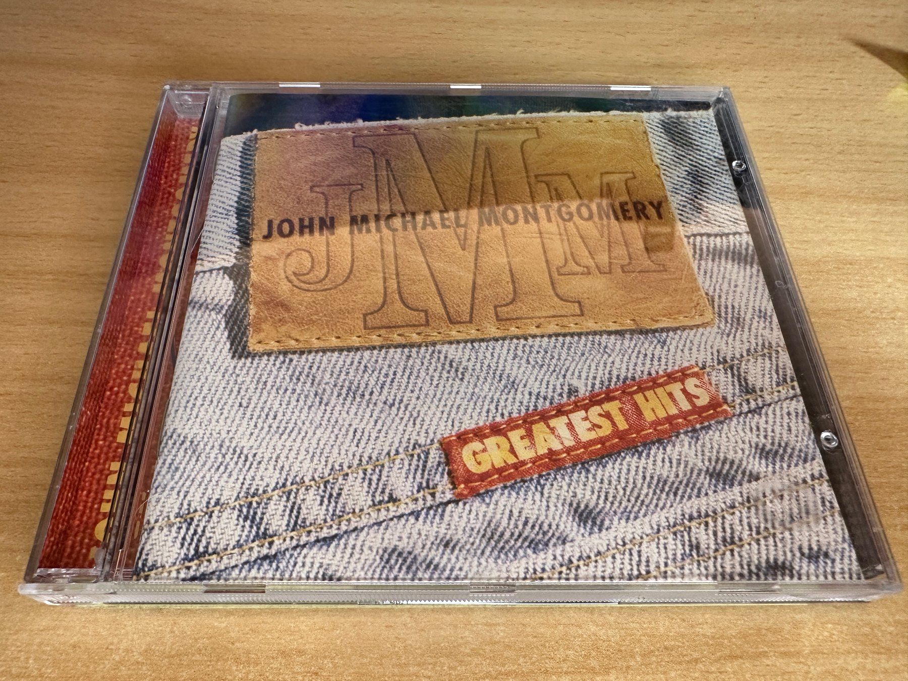 CD: F6 John Michael Montgomery – Greatest Hits – Usato da Rikon im Tösstal venduto da Alpenmutz