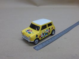 Mini Cooper Spielzeugauto gelb bunt gebrauchter Zustand