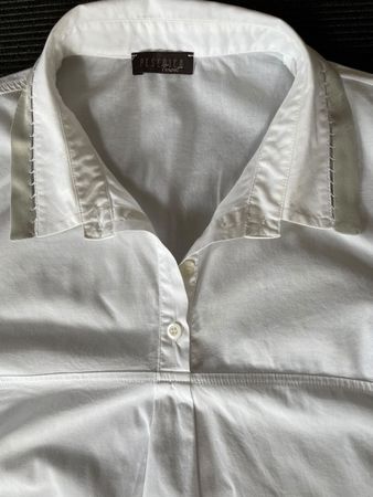 Chemise sans manches blanche taille 42 bon état