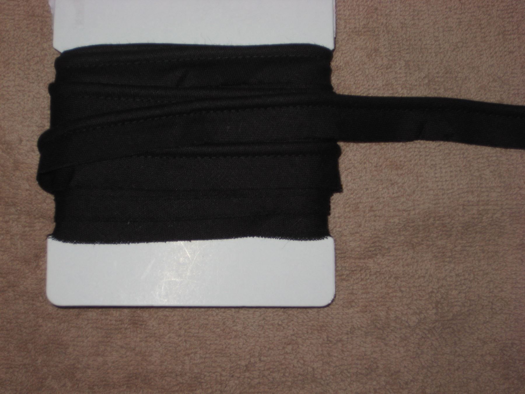 Nastri decorativi: Paspelband Baumwolle schwarz 13mm breit – Nuovo e nell'imballaggio originale da Füllinsdorf venduto da Schlupp