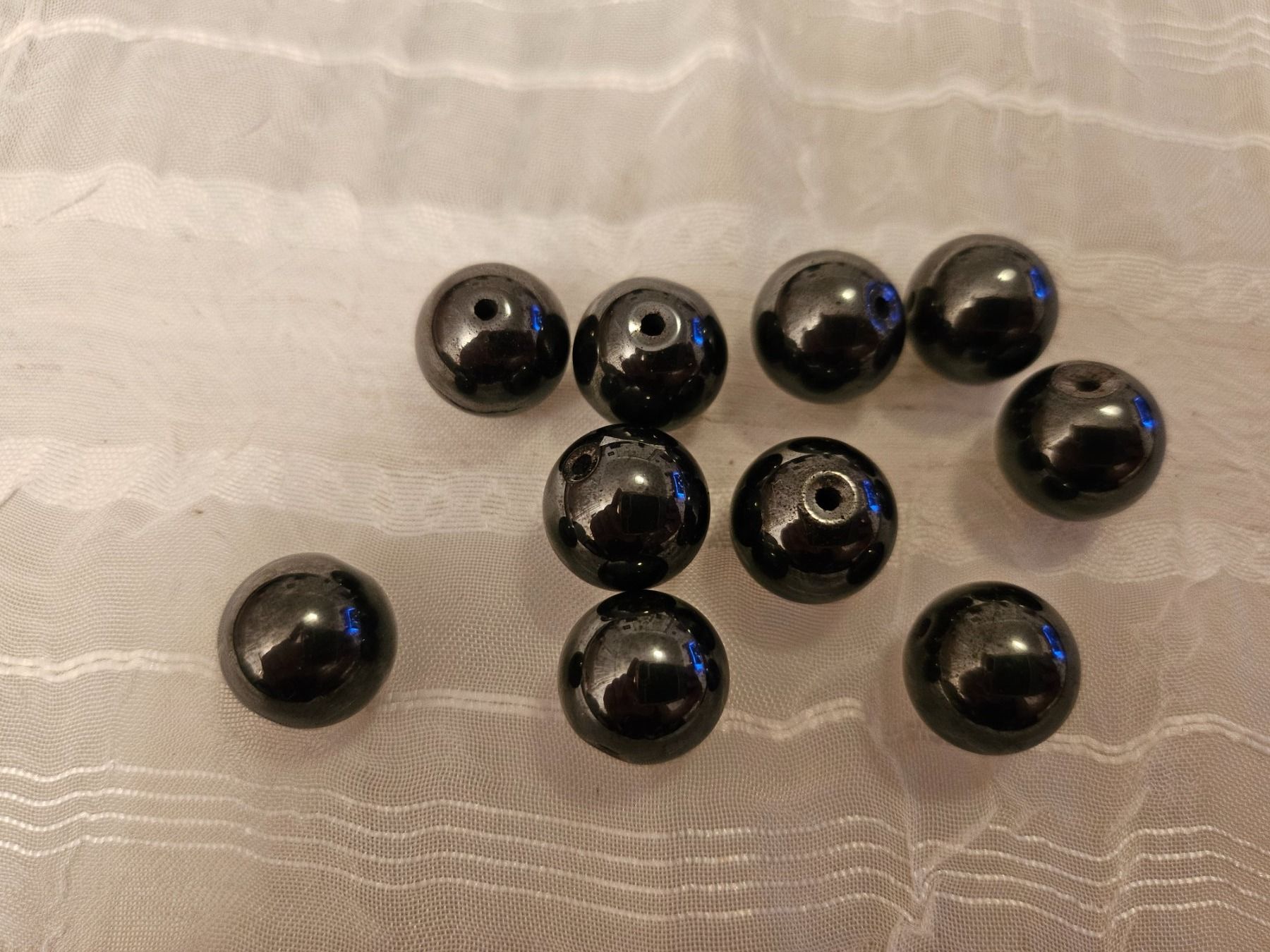 Perle (finte): 10 Stk Hämatit Perlen 12mm – Nuovo (secondo la descrizione) da Dietikon venduto da Eleda