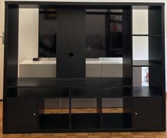 Meuble TV noir avec étagères et rangement occasion