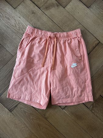 orange nike shorts