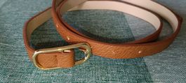 Brown synthetic leather belt with gold buckle