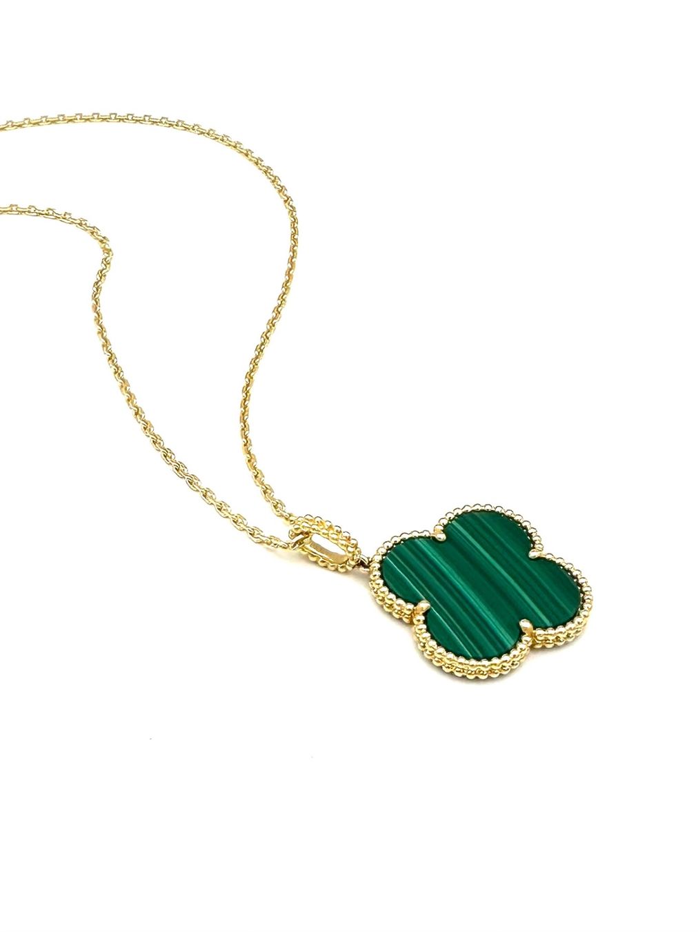 Van Cleef Catenine: VAN CLEEF & ARPELS. Sautoir "Magic Alhambra" or et malachite – Usato da Renens VD venduto da Diademe.sarl 2