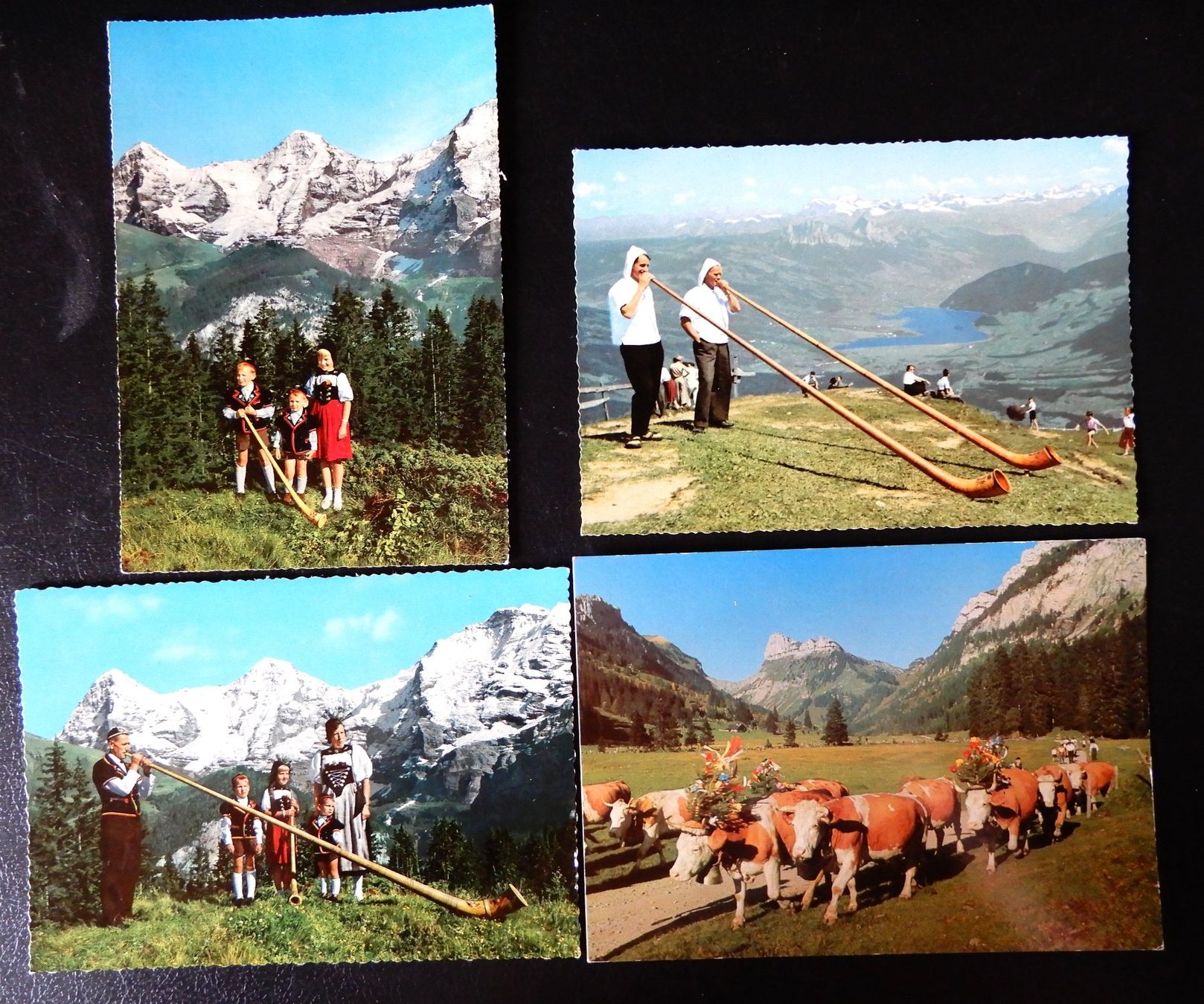 Cartoline postali: 4 Ansichtkarten Alphornbläser und Alpabfahrt – Usato da Senèdes venduto da Framboise52