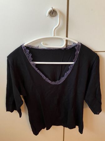 Top noir avec col orné en taille 38
