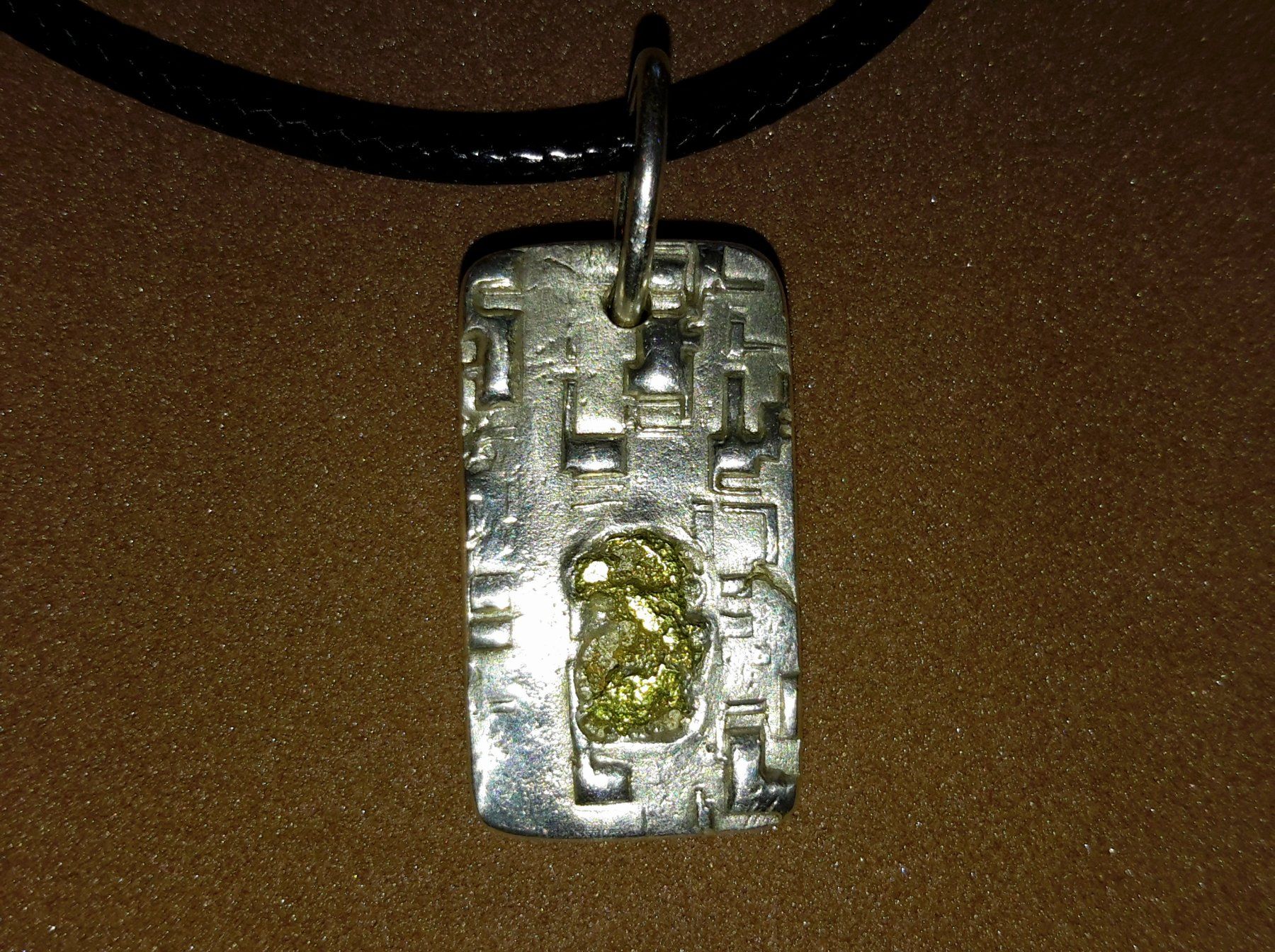 Metalli preziosi: Silber Anhänger mit Schweizer Gold Nugget – Nuovo e nell'imballaggio originale da Uerkheim venduto da Winwinner