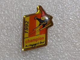 Ansteckpin 203: 1992 Champion "n"