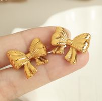 Elegante goldene Ohrringe in Schleifenform – Neuwertig!✨