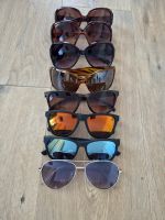 8 Sonnenbrillen
