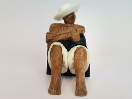 Holzfigur Panflötenspieler