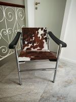 Poltrona in pelle di cavallino e metallo cromato design
