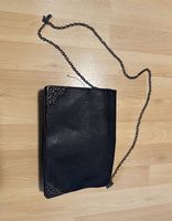 Schwarze Clutch 
