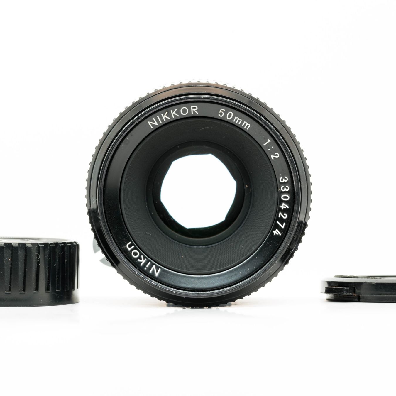 Nikon Objektive: Nikon NIKKOR 50 mm F2 Objektiv – Gebraucht aus Thörishaus von vintagger