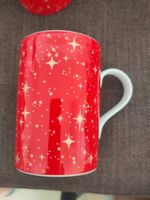 4 Kahla Weihnachtstassen. rot mit goldenen Sternen