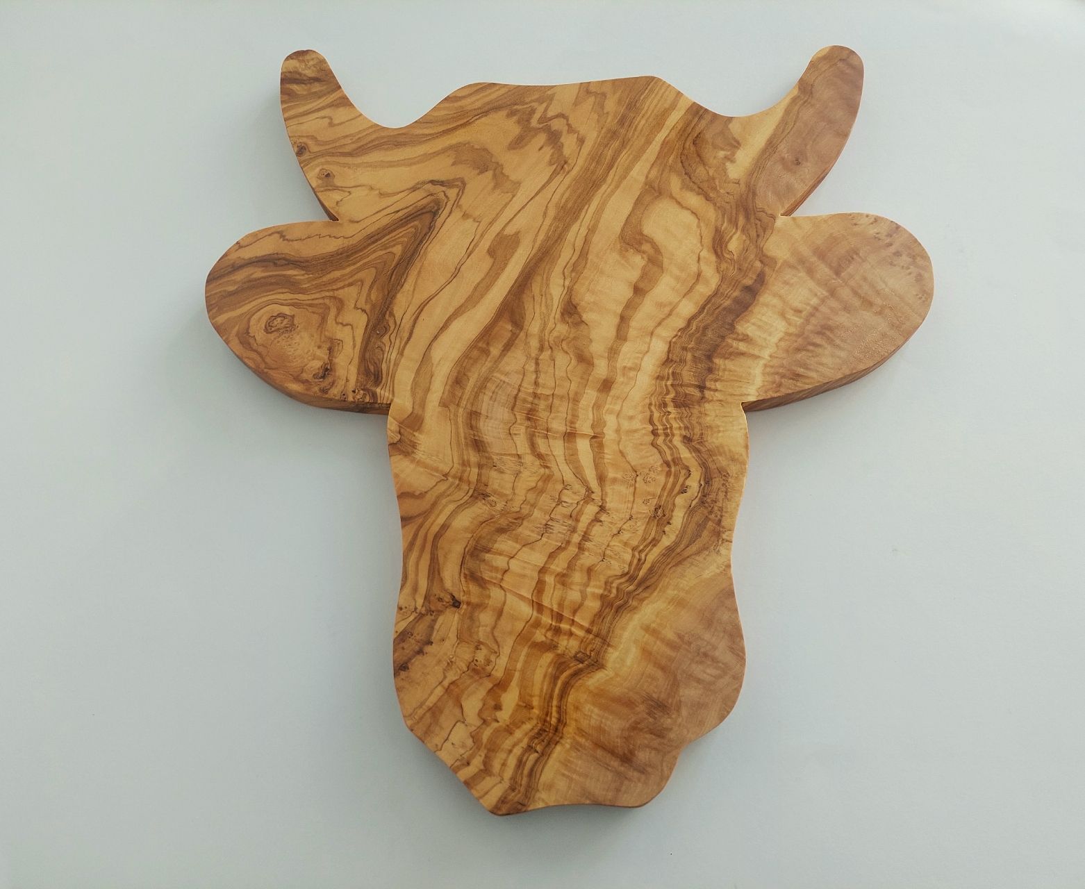Articoli in legno: Olivenholz Brett in Kuhform – Nuovo e nell'imballaggio originale da Hüntwangen venduto da Elyha